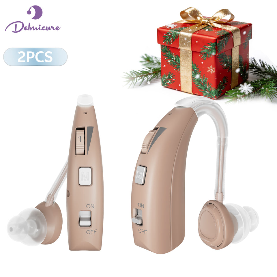 Two beige Delmicure VHP-1303 hearing aids with clear sound tubes and silicone ear domes