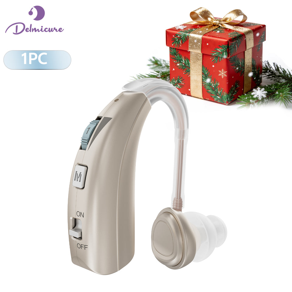 One gold Delmicure VHP-1303 hearing aid with clear sound tubes and silicone ear domes